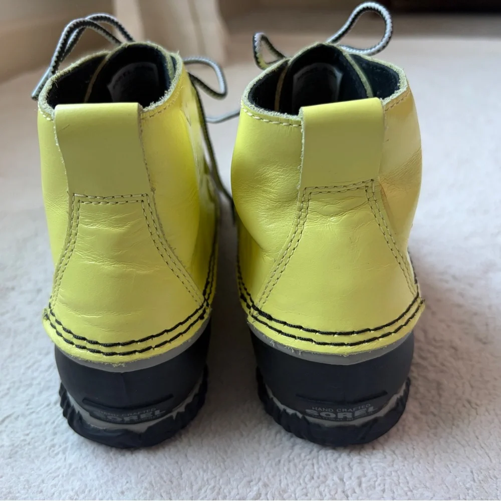 Sorel Out And About Yellow and Black Winter or Rain Boots Women Size 9